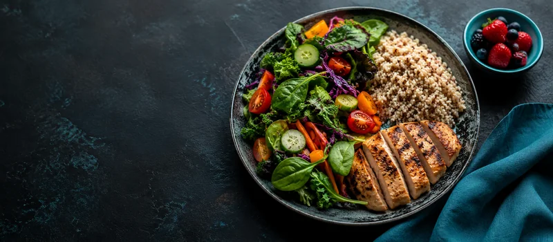 A plate built on the DASH diet — vegetables, whole grains, lean protein